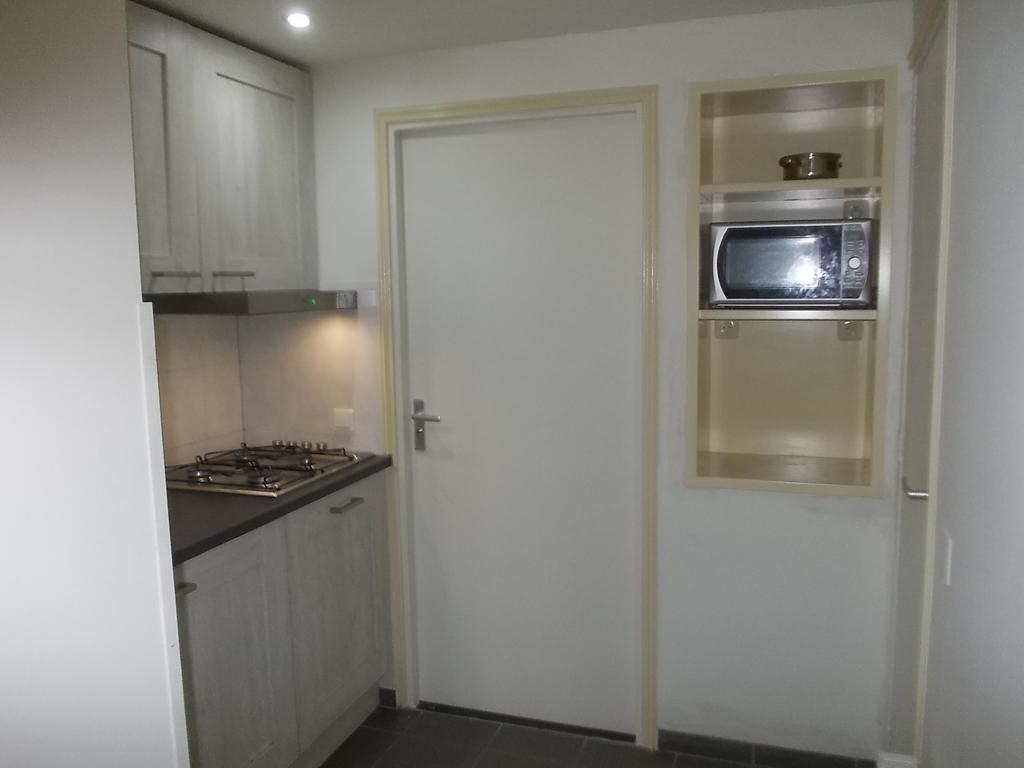 Apartment + Studios Insulinde Tilburg Rom bilde